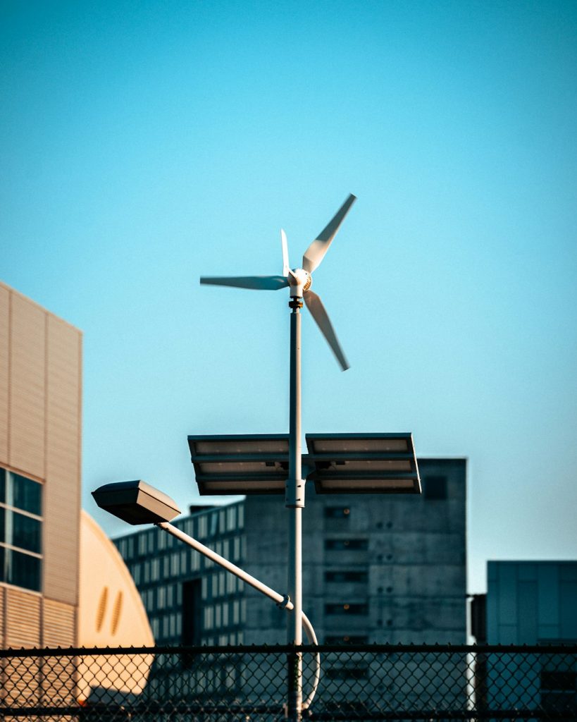 a-wind-turbine-on-top-of-a-metal-pole-xxmt1vpfr48